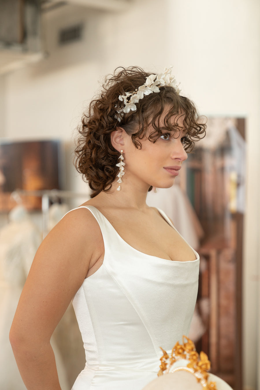 New York Bride wearing bridal flower crown and matching long flower wedding earrings.  The perfect Jewelry set.