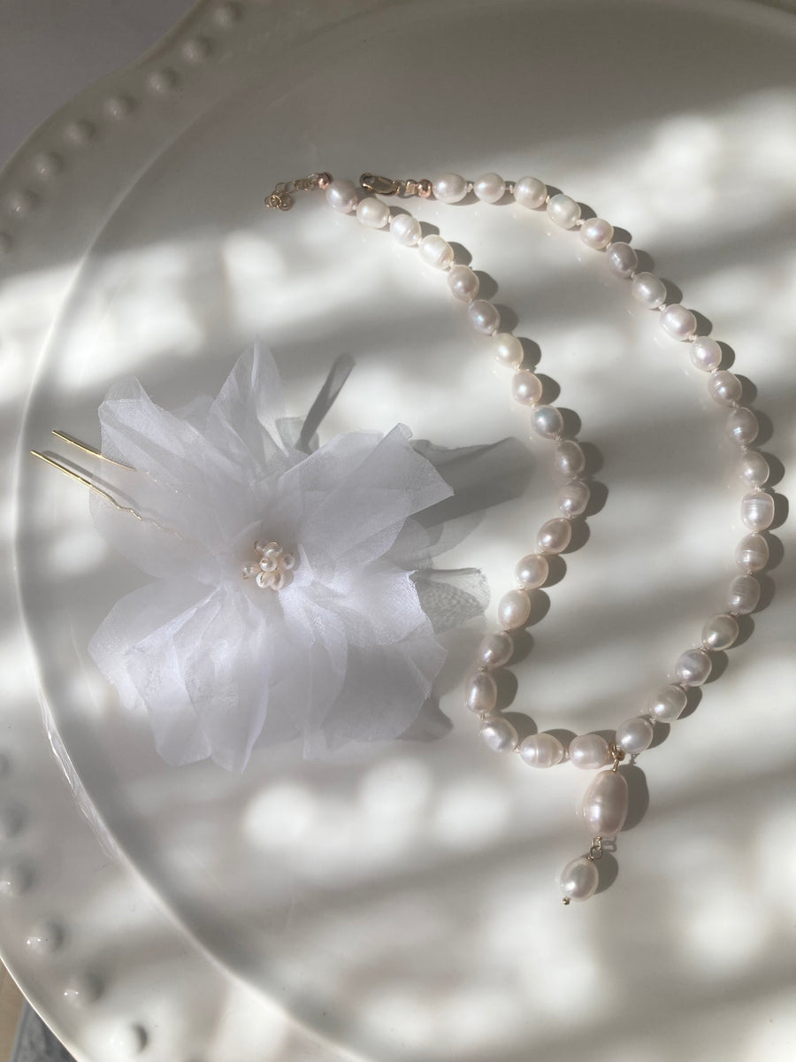 Silk knotted pearl bridal necklace with baroque pearl drop by Joanna Bisley Designs.