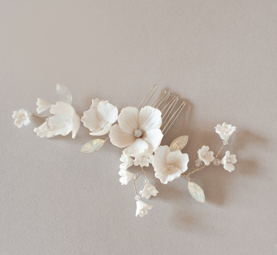 Exquisite flower bridal comb with white opal detailing by Joanna Bisley Designs.