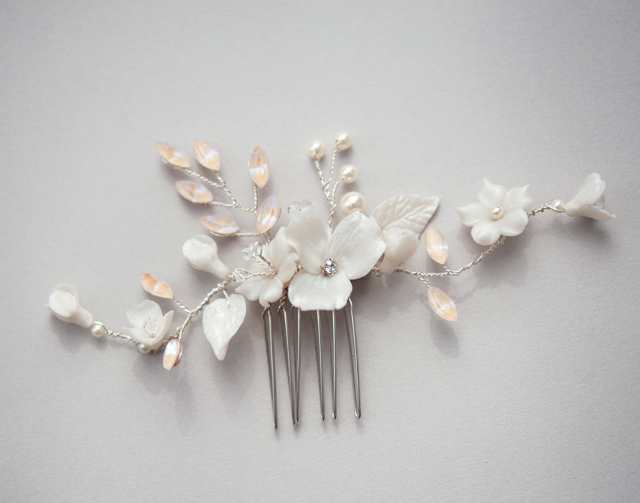 A handcrafted bridal comb made with Swarovski Crystals and Flowers by Joanna Bisley Designs.