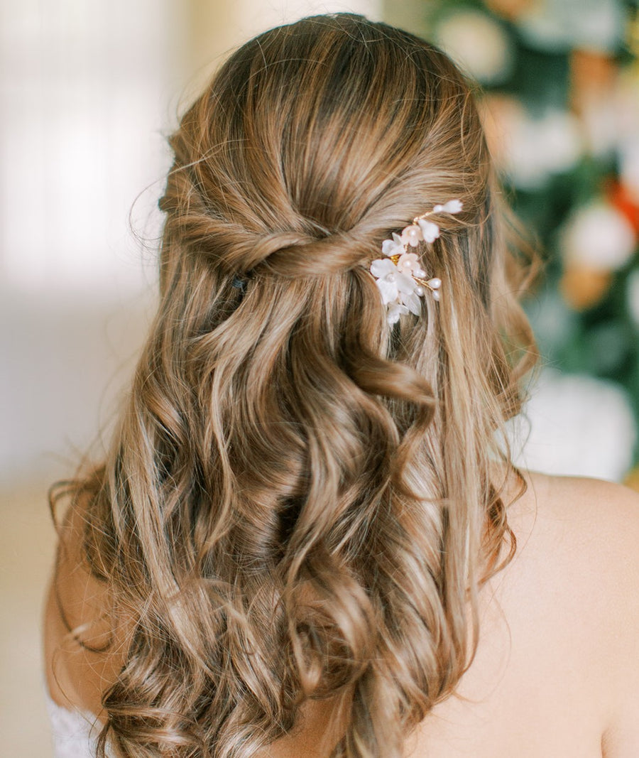 California Bride with half up half down bridal hairdo wearing  small bridal comb by Joanna Bisley Designs.