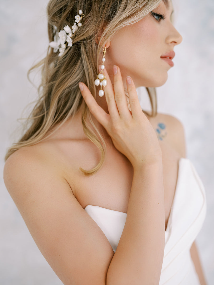 Bride wearing Pearl Bridal Chandelier Earrings 