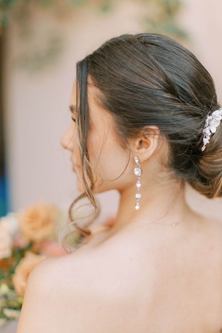 California Bride wearing luxury bridal earrings by Joanna Bisley Designs.