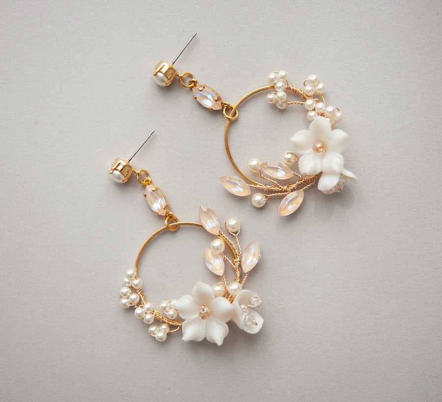 Exquisite blush crystal, flower and pearl bridal hoop earrings by Joanna Bisley Designs. 