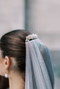 Toronto bride wearing wedding veil with freshwater pearl comb.