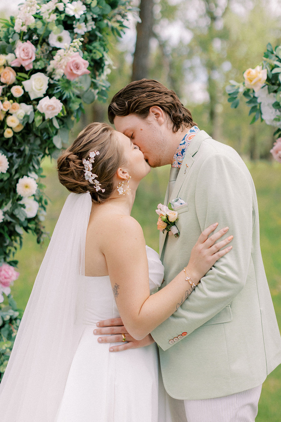 Calgary bride wearing her hair up with Joanna Bisley Designs floral bridal comb adorning it.