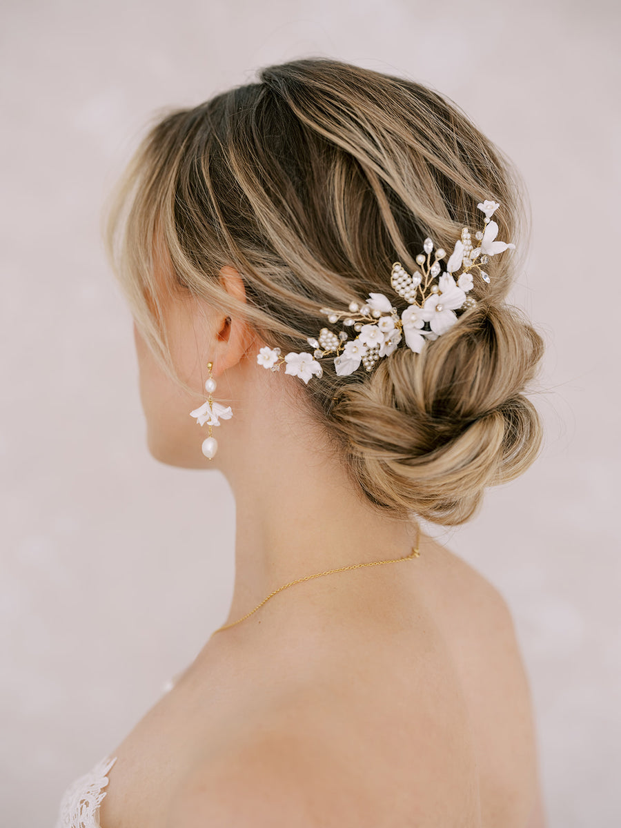 Bridal updo with luxurious bridal comb adorning it.