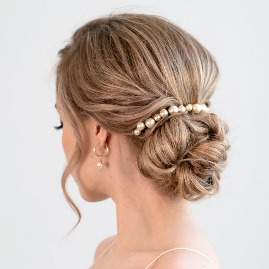 Unique pearl bridal comb by Joanna Bisley Designs.