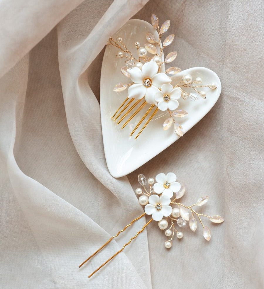 A set of exquisite blush bridal hairpins by Joanna Bisley Designs.